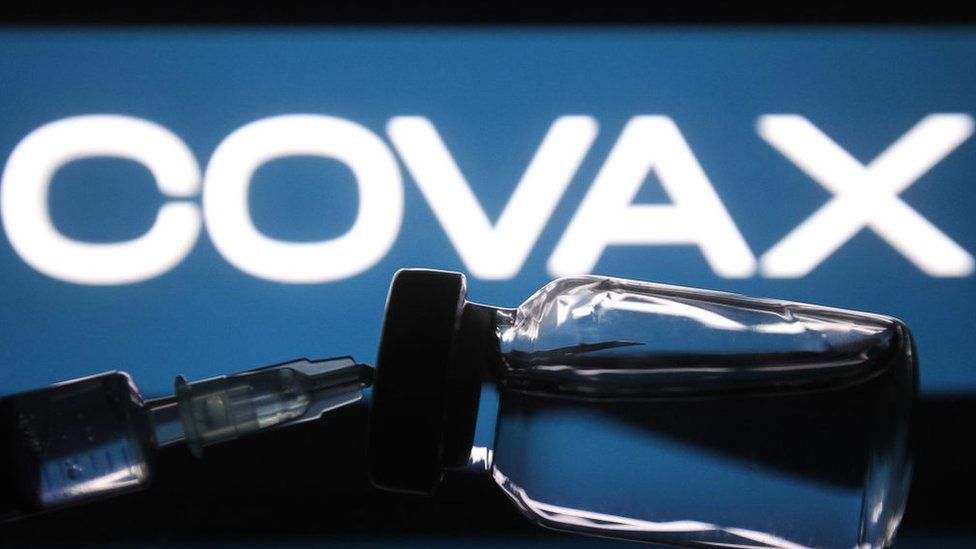 Covax logo with vial of vaccine