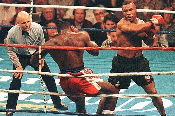 Mike Tyson Defeats Frank Bruno To Capture The Wbc Heavyweight Title
